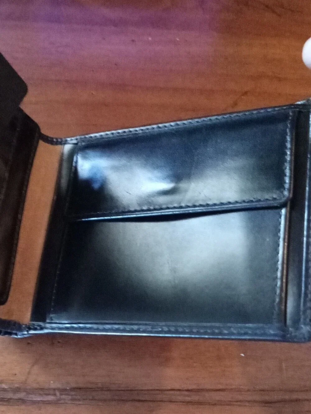 Tommy Hilfiger Black Embossed Leather Bi-Fold Wallet